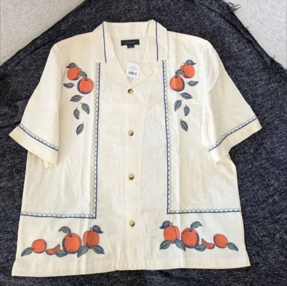 Cotton On Cream Shirt with Orange and Blue Accents